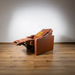 Brown leather recliner massager chair.